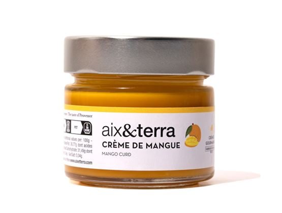 Pot de crème de mangue aix&terra avec un couvercle gris, présenté sur fond blanc.