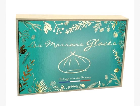 Coffret de marrons glacés Pellorce & Jullien, présenté dans une boîte turquoise décorée de motifs végétaux sur fond blanc.