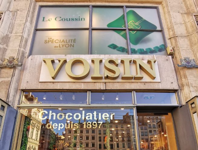 Storefront of Voisin, a historic Lyon-based chocolatier founded in 1897