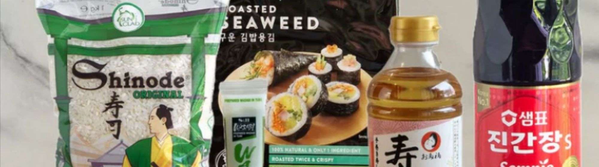 Selection of Korean food products, including premium sushi rice, seaweed, soy sauce, and other traditional ingredients for authentic Korean cuisine.