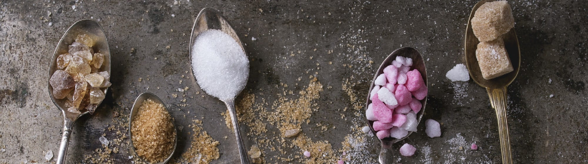 Cuillères avec des sucres différents